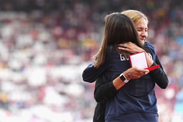 Kara Goucher receiving upgraded medal