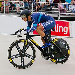 Mandy Marquardt riding in a track cycling competition.