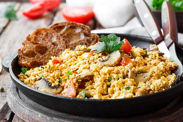 Veggie and egg scramble with toast.