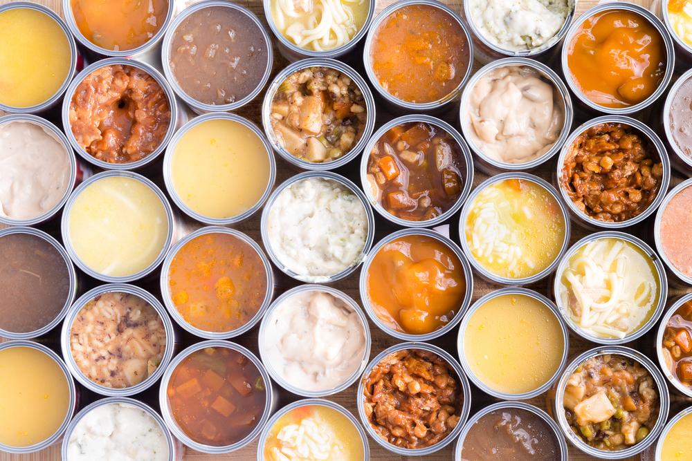 Overview of open cans of soup.