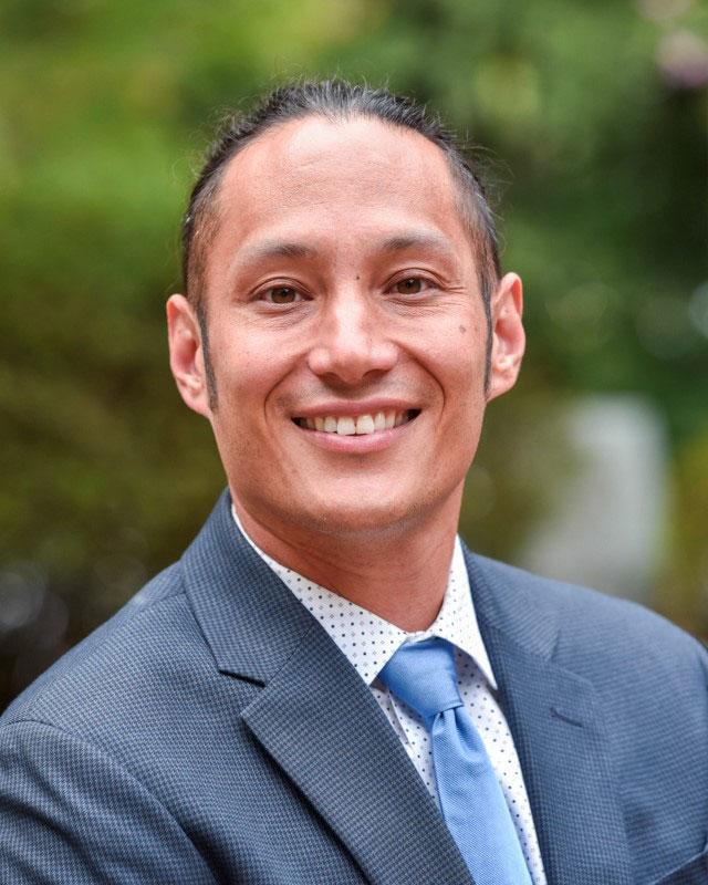 Coach Powell Paguibitan headshot.