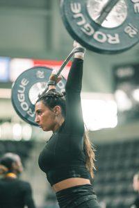 Abby Raymond lifting weights.