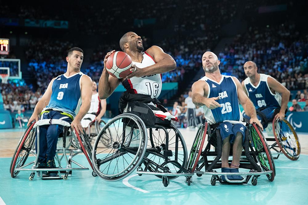Trey Jenifer during a wheelchair basketball game. Trey Jenifer during a wheelchair basketball game.
