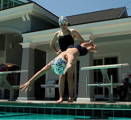 usa swimming kid diving into pool