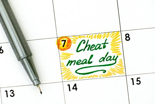 A calendar day labeled "cheat meal day."