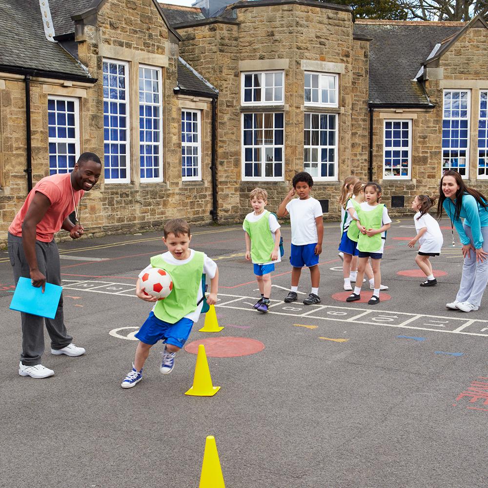 Group Of Children In School Physical Education Class