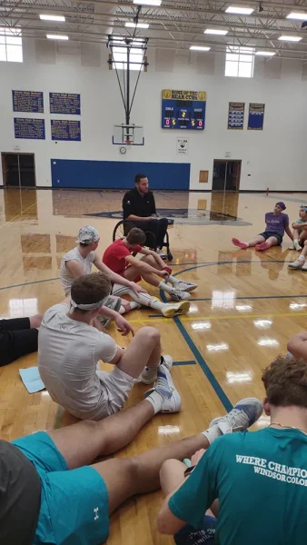 TrueSport Club students talking to Athlete Ambassador Joe Delagrave.