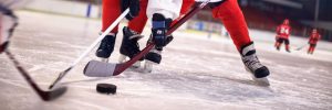 Close up of hockey players during game.