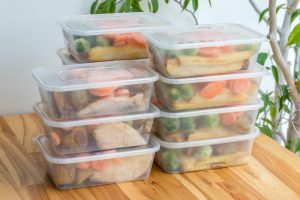 Meals stacked in tupperware containers.
