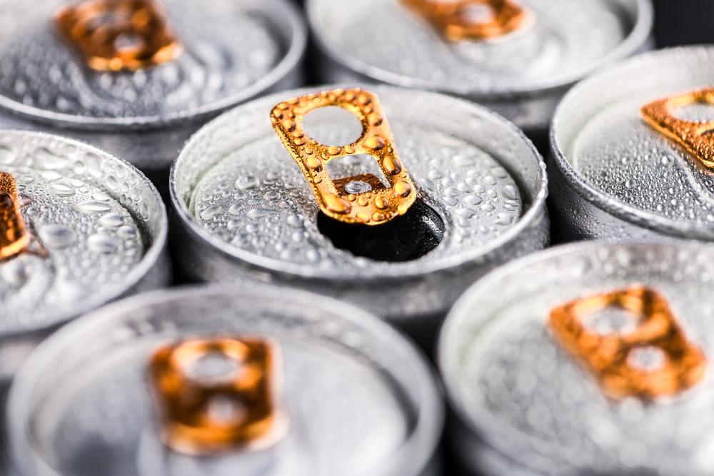 Top of energy drinks cans close up.