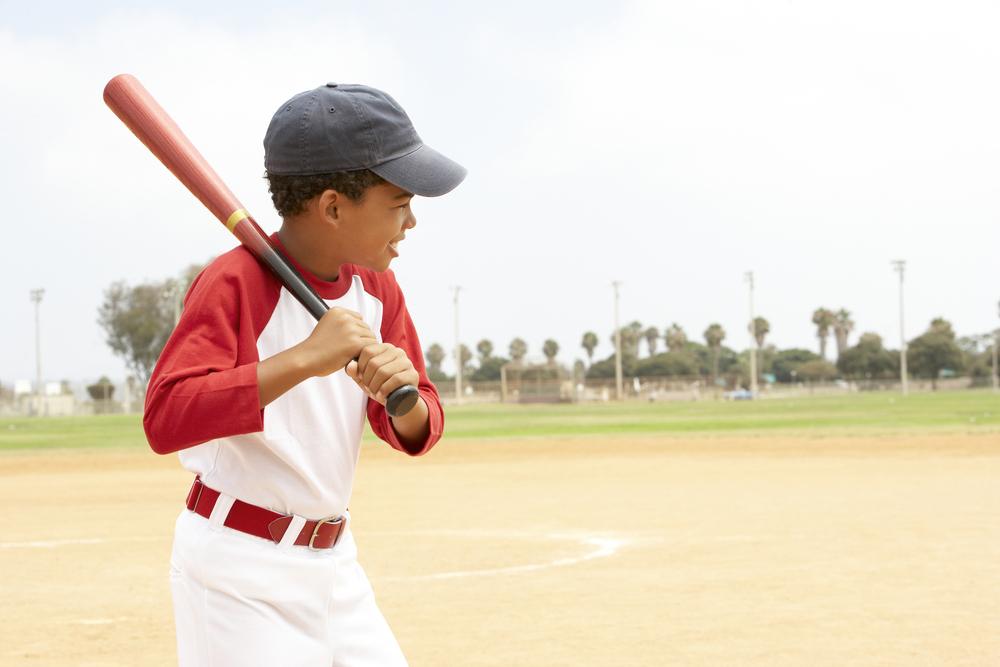 little kids playing baseball