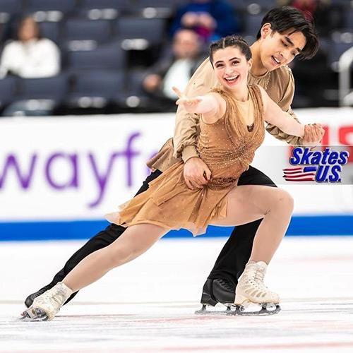 Luke Wang and Olivia Flores pairs figure skating on the ice.