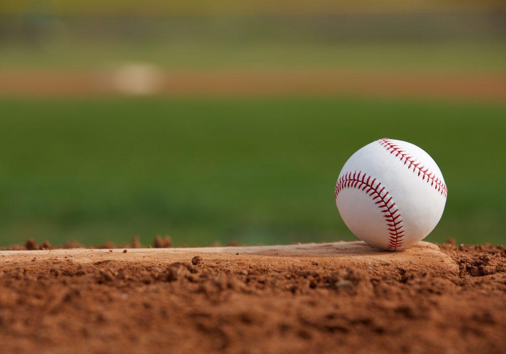 Baseball on a pitcher's mound.
