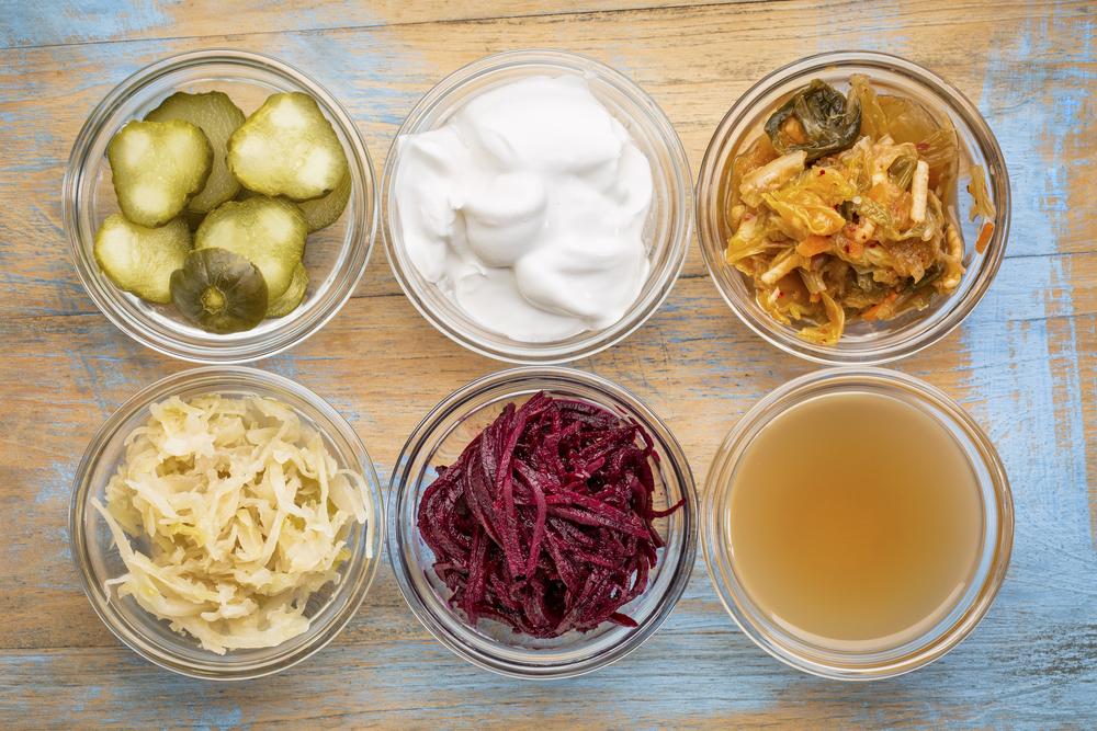 Variety of fermented foods in small bowls.