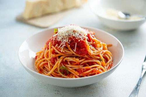 Spaghetti and marinara in a bowl.