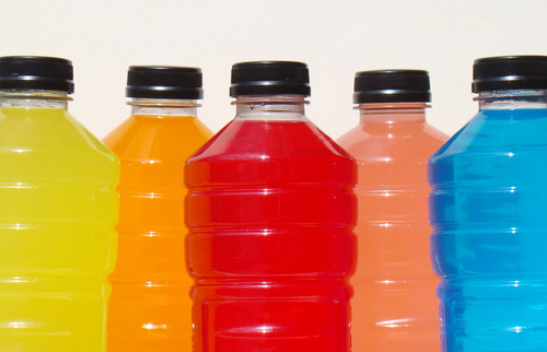 Variety of colored sports drinks.