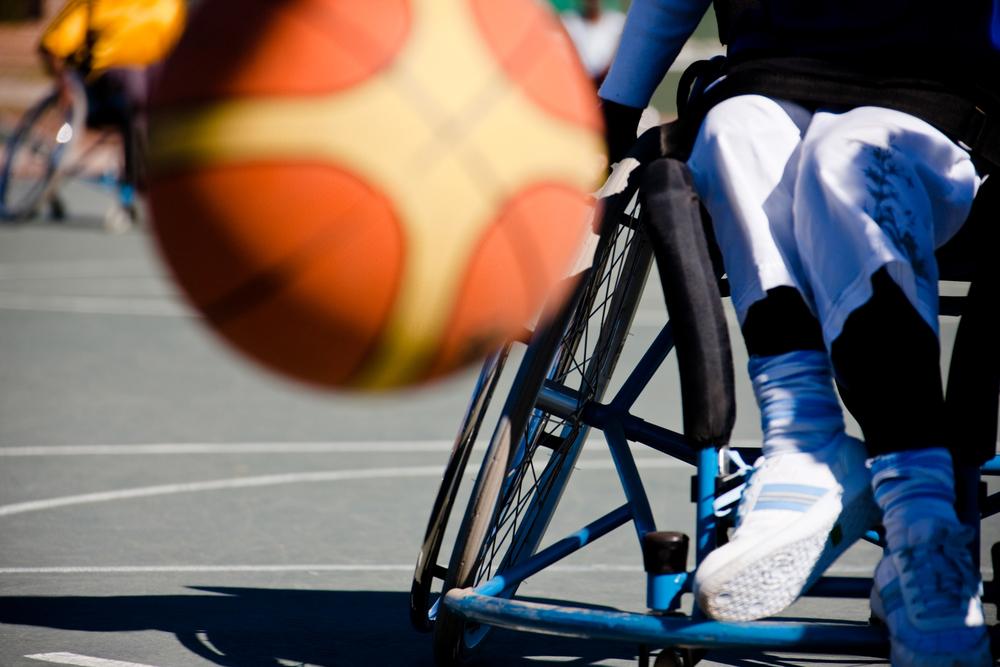 Close up of wheelchair basketball game.