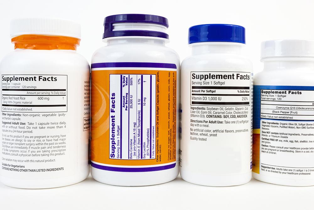 Various dietary supplement bottles.