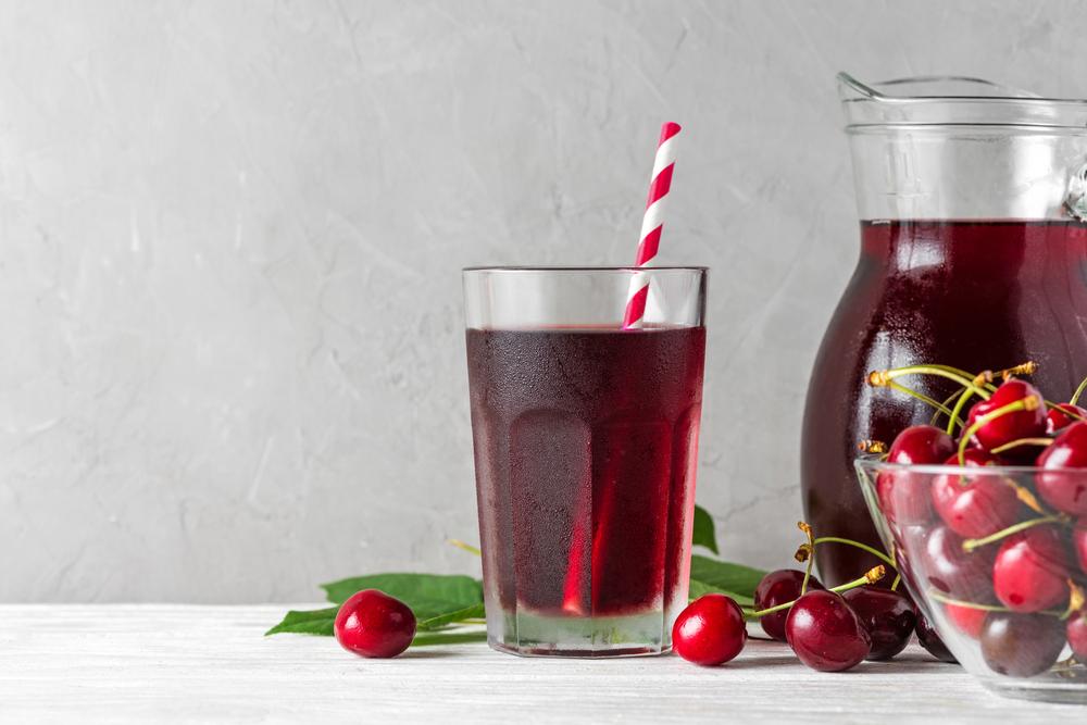 Cherry juice in a glass.